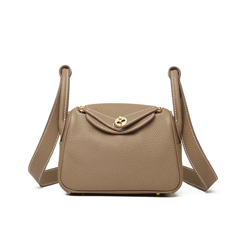 Elegant Lychee-Pattern Cowhide Messenger Bag with Wide Shoulder Strap